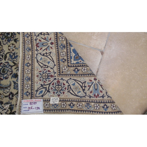 495A - A hand knotted woollen Nain rug - 1.95m x 1.32m