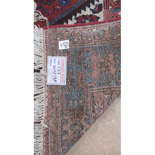 497 - A hand knotted woollen Hamadan rug - 2.04m x 1.38m