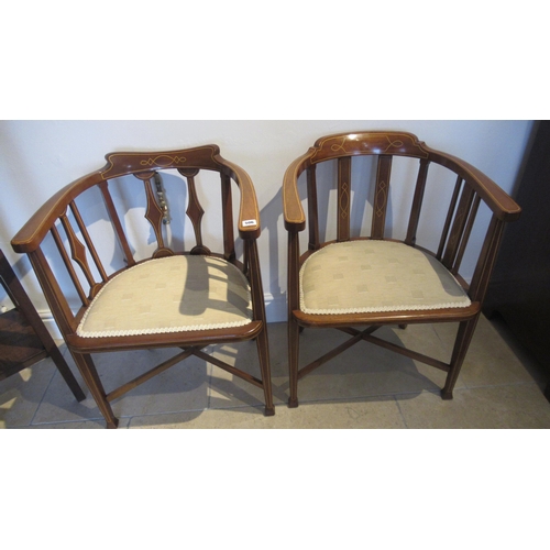 506 - A pair of Edwardian mahogany and satinwood line inlaid upholstered bow back armchairs - good conditi... 