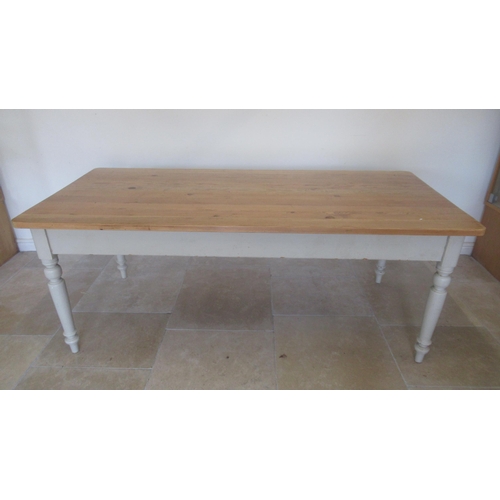 513 - A 19th century pine kitchen table with one drawer and a dummy drawer painted base and re-polished to... 