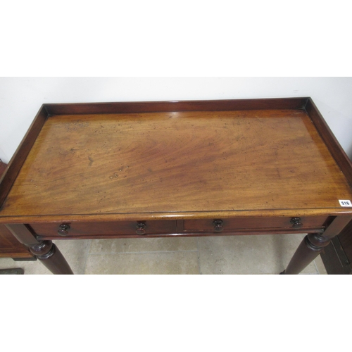 516 - A 19th century mahogany side table / desk with two drawers on turned legs, good patina, 105cm wide x... 