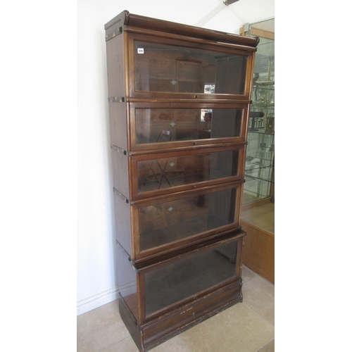 519 - A mahogany veneer Globe Wernicke 5 section stacking bookcase, 189cm tall x 87cm wide