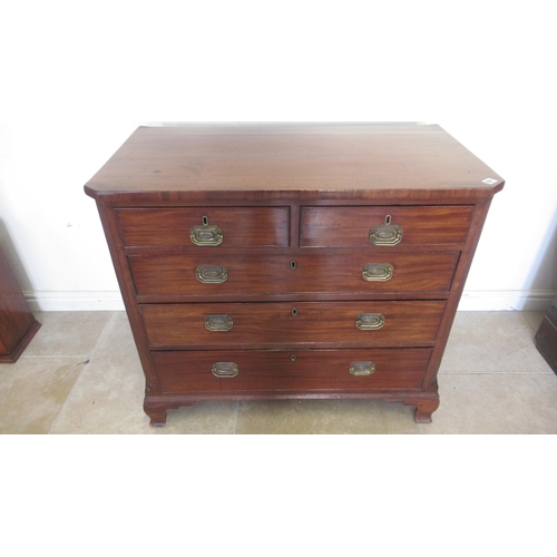 521 - A Georgian mahogany chest with canted corners and two short over three long drawers on bracket feet,... 