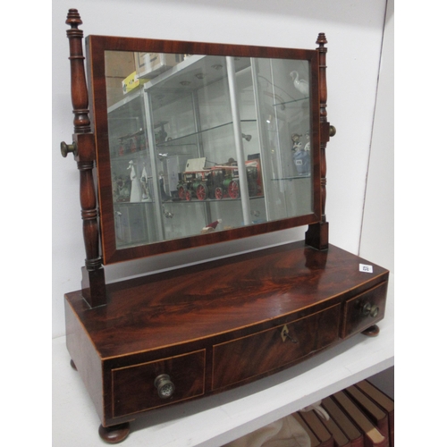 531 - A Georgian mahogany bow fronted three drawer dressing table mirror, 52cm wide x 50cm high, in good c... 