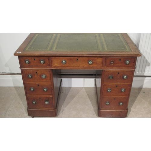 541 - A 19th century mahogany 9 drawer twin pedestal desk with a leather inset top, 105cm wide x 72cm high... 