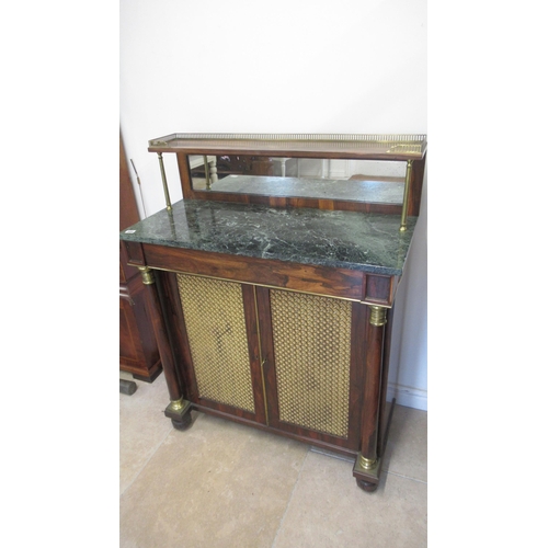 544 - A 19th century rosewood chiffonier with a galleried back above a marble top with two grillwork doors... 