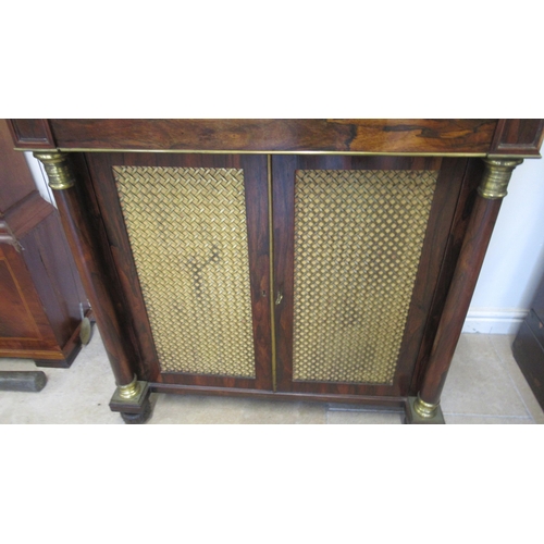 544 - A 19th century rosewood chiffonier with a galleried back above a marble top with two grillwork doors... 