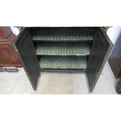 544 - A 19th century rosewood chiffonier with a galleried back above a marble top with two grillwork doors... 