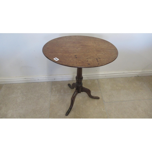 545 - A 19th century mahogany oval tilt top side table