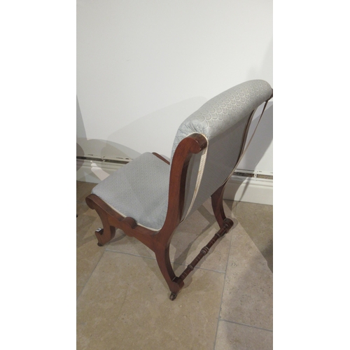 548 - A Victorian mahogany nursing chair