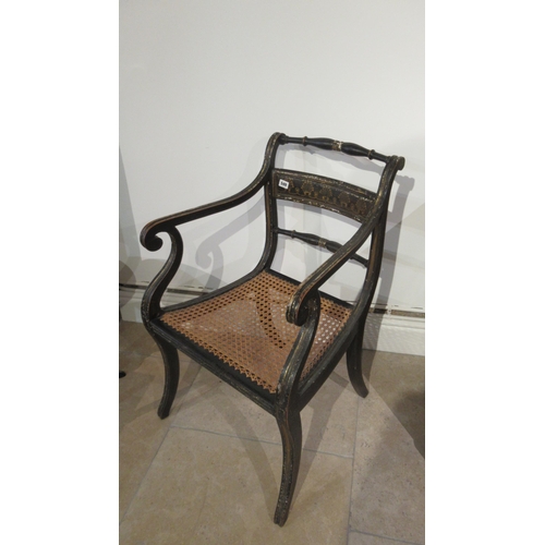 549 - An early 19th century chinoiserie Bergere armchair