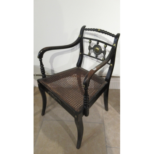 550 - An early 19th century chinoiserie Bergere armchair