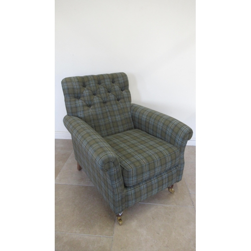 555 - A Victorian style wing armchair in good condition