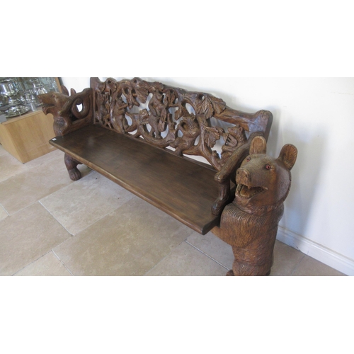 570 - A Black Forest carved bench, Victorian and later - may have been reduced in length - Width 190cm