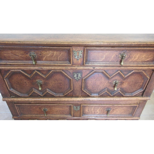 576 - A Jacobean Chest of four drawers, made in two pieces so that the top and first two rows of drawers a... 