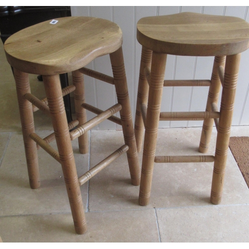 588 - Two oak bar stools