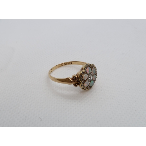 66 - An 18ct (hallmarked) yellow gold diamond and opal daisy cluster ring size R/S - weight approx 3.6 gr... 