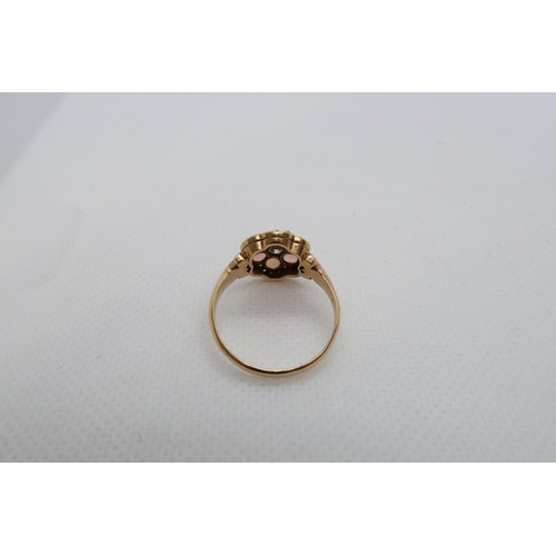 66 - An 18ct (hallmarked) yellow gold diamond and opal daisy cluster ring size R/S - weight approx 3.6 gr... 