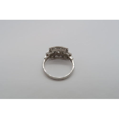 7 - An Art Deco style platinum three row diamond ring with diamond shoulders - diamond weight approx 1.5... 