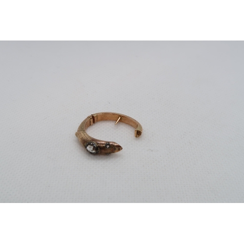 71 - A good yellow gold scarf/cravat ring in the form of a Dolphin and set with rose cut diamonds - appro... 