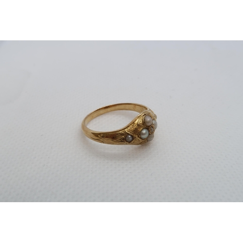 74 - A yellow gold ring with pearls - 3.4grams