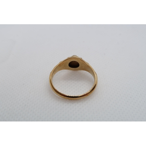 74 - A yellow gold ring with pearls - 3.4grams