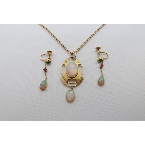 76 - A 15ct yellow gold (hallmarked) Art-Nouveau opal pendant with rose cut diamond accents - central ova... 