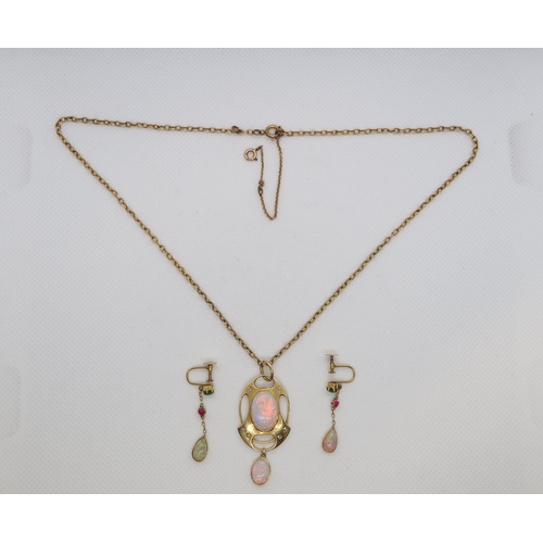 76 - A 15ct yellow gold (hallmarked) Art-Nouveau opal pendant with rose cut diamond accents - central ova... 