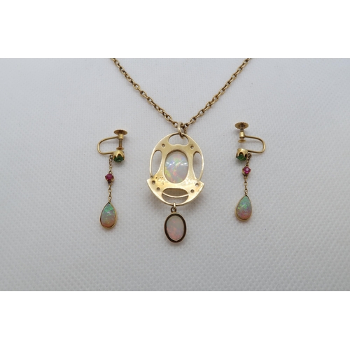 76 - A 15ct yellow gold (hallmarked) Art-Nouveau opal pendant with rose cut diamond accents - central ova... 