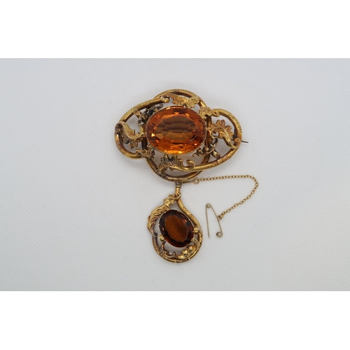 77 - A large and ornate Victorian pinchbeck citrine brooch - 8cm x 6cm