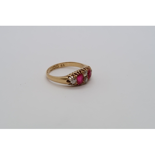 88 - An 18ct yellow gold ruby and diamond bridge ring, size O, approx 3.9 grams