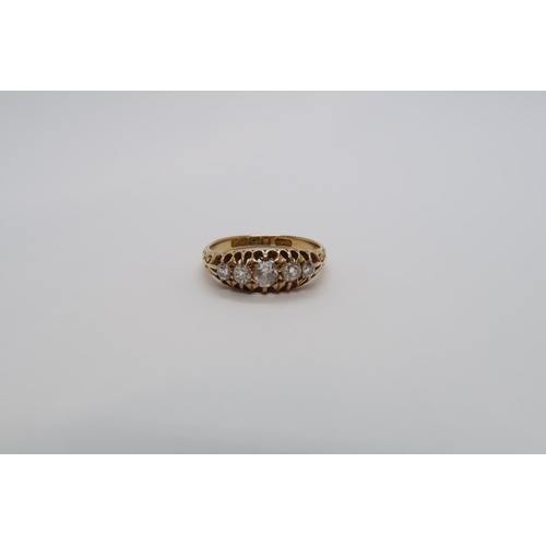 89 - An 18ct yellow gold hallmarked diamond 5 stone ring set with graduated old cut diamonds, size O, app... 