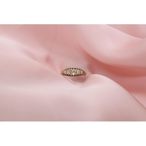 89 - An 18ct yellow gold hallmarked diamond 5 stone ring set with graduated old cut diamonds, size O, app... 