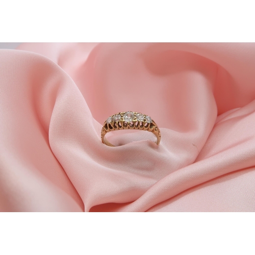 89 - An 18ct yellow gold hallmarked diamond 5 stone ring set with graduated old cut diamonds, size O, app... 