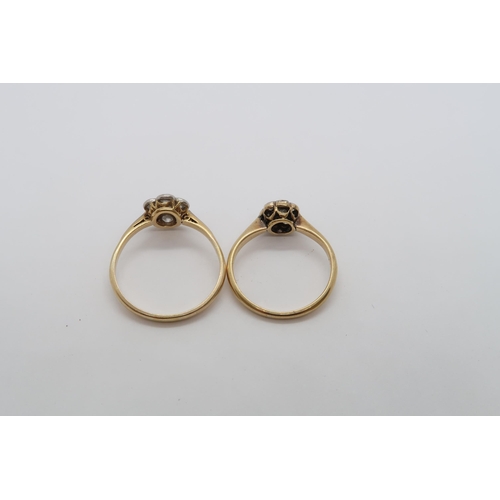 92 - Two 18ct yellow gold hallmarked diamond daisy cluster rings, size L and O/P, approx 4.1 grams