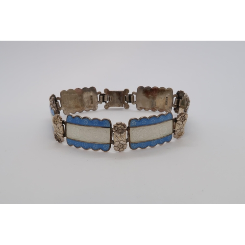 94 - A Harmony silver and enamel bracelet, six rectangular links with floral decoration with blue and whi... 