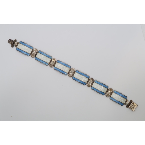 94 - A Harmony silver and enamel bracelet, six rectangular links with floral decoration with blue and whi... 