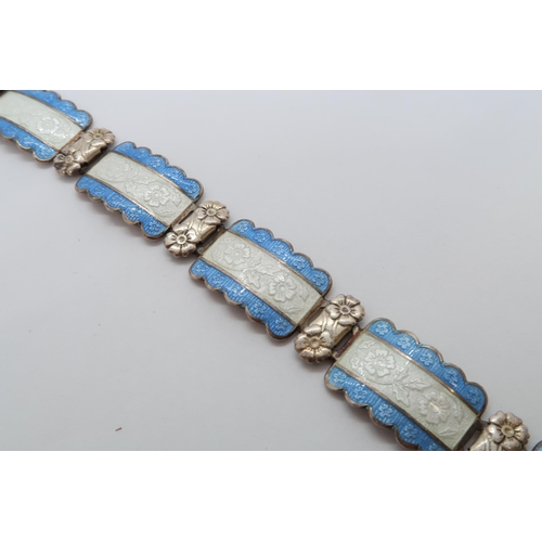 94 - A Harmony silver and enamel bracelet, six rectangular links with floral decoration with blue and whi... 