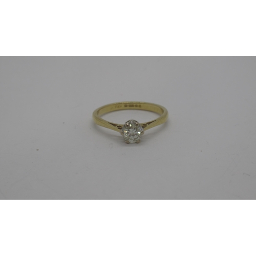 166 - An 18ct  yellow gold (hallmarked) diamond solitaire single stone ring - round brilliant cut diamond ... 