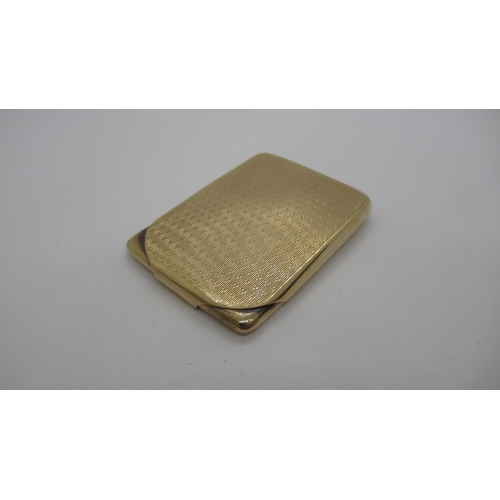 211 - A 9ct (hallmarked) gold card case with machined decoration to front and back - good overall conditio... 