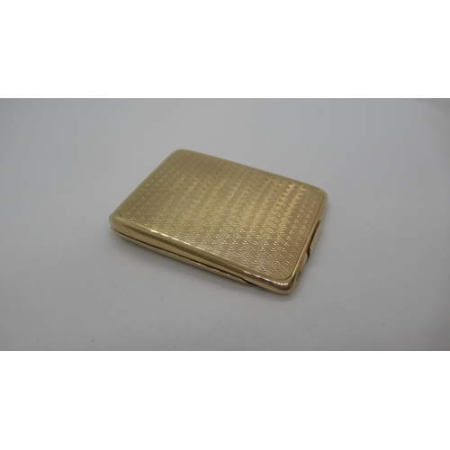 211 - A 9ct (hallmarked) gold card case with machined decoration to front and back - good overall conditio... 