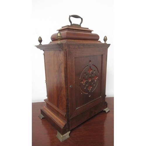 565 - A Lenzkirch mahogany architectural 8 day mantel clock with brass dial on four brass feet with carry ... 