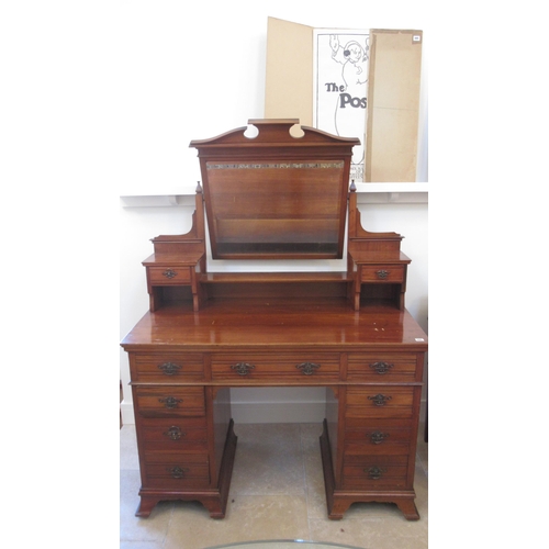 593 - A satinwood dressing table with a mirror over nine drawers - Width 120cm - and a single balloon back... 