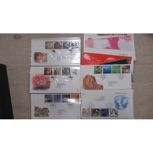 327A - An album of Royal Mail millennium coin covers (11) together with a quantity of Royal Mail FDCs and c... 