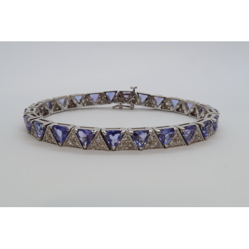 6A - A stunning Art Deco style tanzanite and diamond line bracelet - 24 triangle cut tanzanite's alternat... 