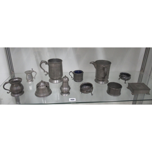 414 - Eleven items of antique Pewter inc jugs, salts