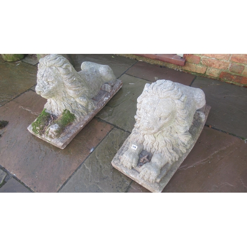 656 - A pair of good quality concrete lions, 83cm long x 48cm high