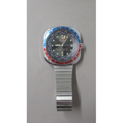 292 - SICURA. Globetrotter 70's world timer. Manual 4 hands and sweep seconds. 40mm. Outer numbered bi dir... 