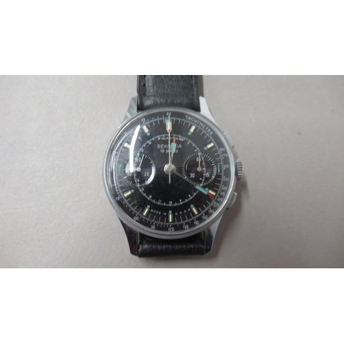 304 - SEKONDA. Chronograph 1960's stainless steel case. 35mm Manual. Black dial. leather strap. working in... 