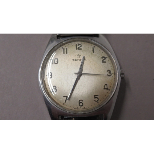 309 - ZENITH. 50's/60's plain steel. 35mm. Arabic numerals. Manual nicely aged. Original button. Working i... 